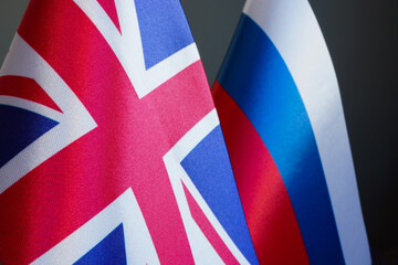 Flags of Great Britain and the Russian Federation.