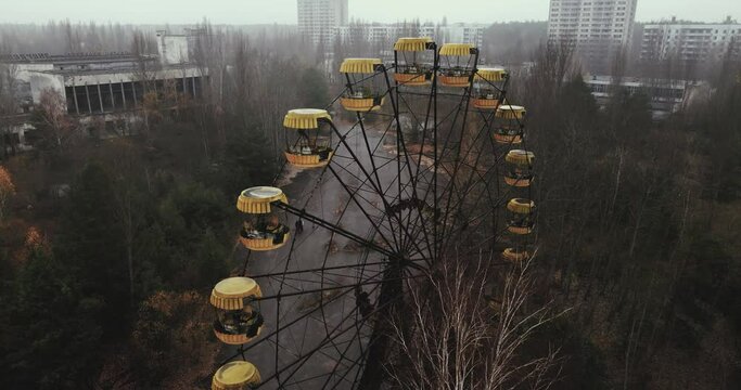 Aerial video of an abandoned Ferris wheel in the Chernobyl amusement park of the Pripyat exclusion zone
