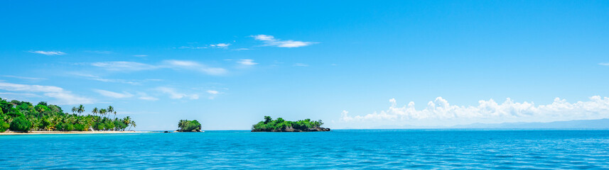 open blue sea cumulus clouds