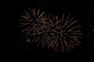 Very beautiful fireworks against the black sky. Graphic resource for design. Underlay or undercoat
