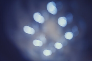 A circle of light on the wall from an electric operating lamp in a hospital, an abstract blurred background