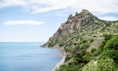 Fototapeta na wymiar Landscape of Crimea in summer, Russia. Rocky coastline in Black Sea
