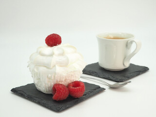 Cake and coffee isolated on white. Breakfast concept