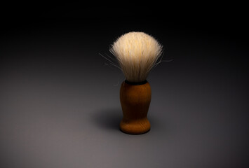 Fototapeta na wymiar shaving brush on grey background , zero waste , reusable .