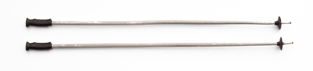 old ski poles isolated on white background