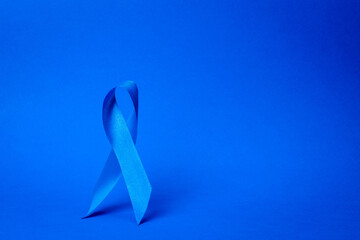 Blue prostate ribbon. Awareness of men health in November with blue prostate cancer ribbon isolated...