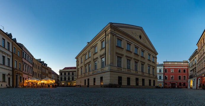 Lublin, Poland - October 31, 2021: A picture of the Old Town Market Square and the Crown Tribunal, at sunset.