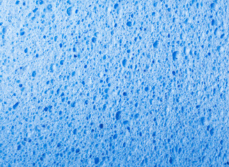 Fototapeta na wymiar Blue dish sponge. Background, texture
