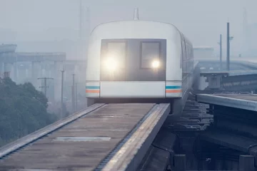 Rolgordijnen Magnetic levitation train approaches to the station. Shanghai. © serjiob74