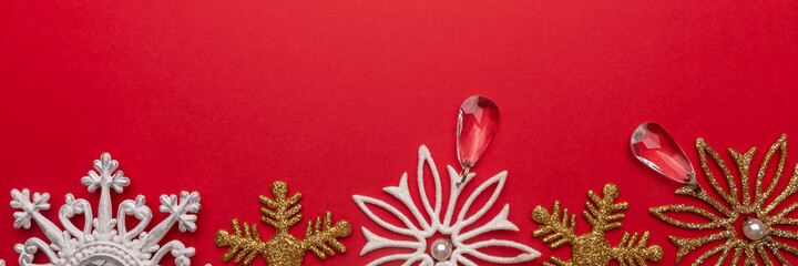 Christmas background with festive decoration, snowflake toys. Festive background with copyspace. Banner.