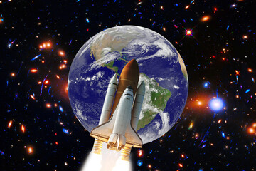 Naklejka premium Earth and rocket in space. The elements of this image furnished by NASA.