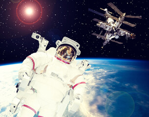 Different spaceships above the earth. Austronauts in outer space. The elements of this image furnished by NASA.