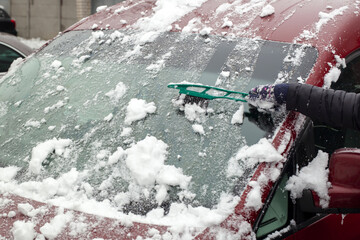 Fototapeta zimowe oczyszczanie samochodu przed każdą jazdą obraz