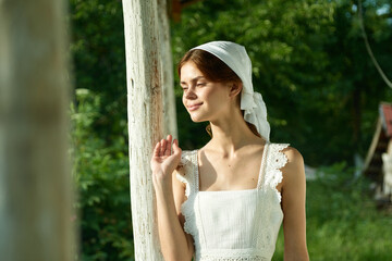 Obraz premium Woman in white dress countryside village nature ecology