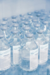 Abstract blur of hospital and clinic interior. Modern equipment in operating room. Medical devices for neurosurgery. Surgery instruments and surgical procedures. Background with blue filter.