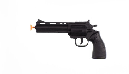 toy black plastic revolver isolated on white background