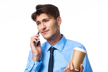 businessmen coffee cup posing office light background