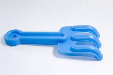 Toy rastel made of blue plastic