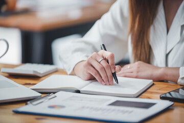 business woman work in the business office on the desk
