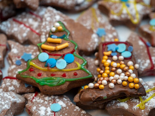 Various Christmas cookies on a Christmas background.