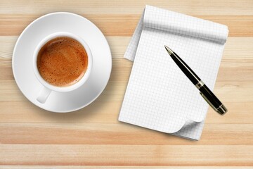 Paper with a cup of coffee, product or business review of the recent year