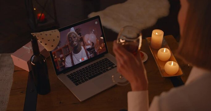Happy couple having video call for celebrating anniversary