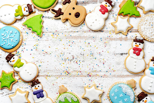 Christmas cookies background. White wooden background with copy space