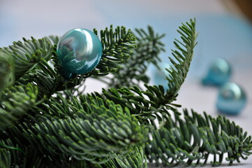 Christmas Tree toys. Christmas balls on a branch of a fir tree. Christmas composition.