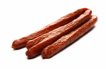 Smoked sausages isolated on white background