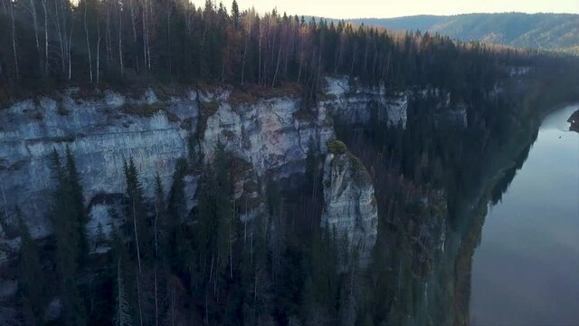 A tourist complex located in the Sortavalsky district of the Republic of Karelia. Clip. A drone photo showing a former marble quarry and forest filled with groundwater.