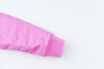 Sleeve with elastic band of  pink bolognese jacket on a white background.