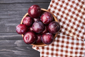 plums fruits natural products on a wooden table top view