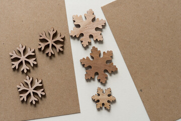 wooden snowflakes with cardboard