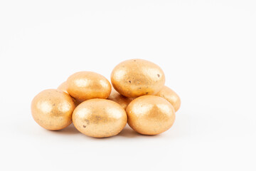 golden easter eggs isolated on a white background. Golden egg, isolated on white background. Vector golden egg. Shiny metallic Easter egg icon for your design.