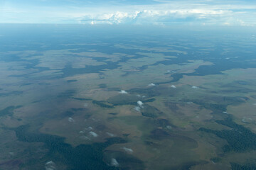 Aerial view of an area of the Marajo island, Para state, Brazil, covered by extensive natural grasslands surrounded by rainforest.