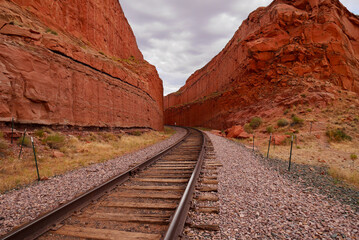 Railway track going through canyon in Moab area, close to Corona Arch trail. Utah, USA.