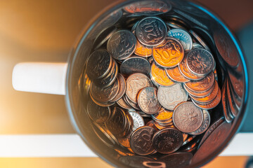 Cup full of polish coins (grosz)