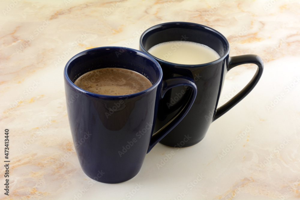 Wall mural hot chocolate and hot white chocolate drinks in blue mugs