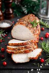 Christmas turkey ham roasted for festive dinner on black background
