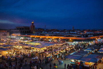Crowd in Jemaa el Fna square in late afternoon at Marrakech, Morocco