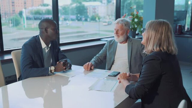 business workgroup team with african man leader discuss