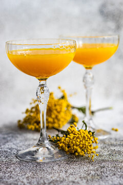 Mimosa Cocktail Drink And Flowers