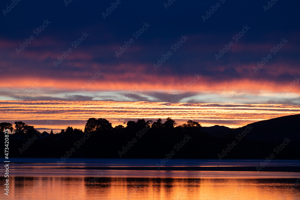 Sticker coastal theme using long exposure for intense color background with orange hue