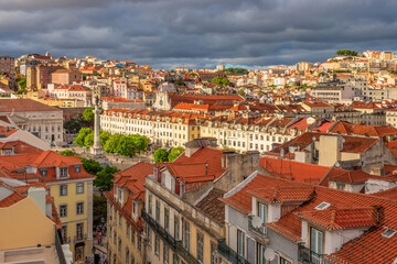 Fototapeta na wymiar View to King Pedro IV Square and old city center streets with orange tiled houses , Lisbon, Portugal