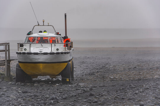 Amphibious vehicle taking tourist to the glacier lagoon Jokulsarlon