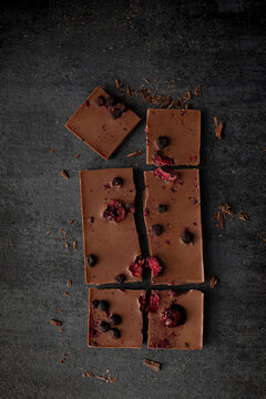 Chocolate bar with cherries and blueberries