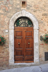 Fototapeta na wymiar Renaissance inlayed front door with grate