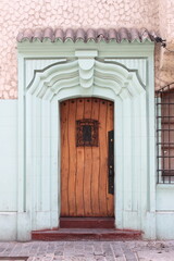 Renaissance front door with grate