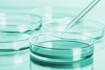 Medical abstract background. Petri dishes and glass pipette on the desk.