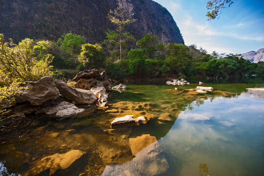 scenic image of the Tha Falang river in Laos
